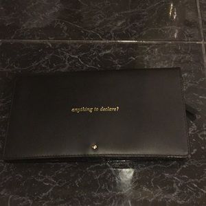 Kate Spate leather traveling wallet